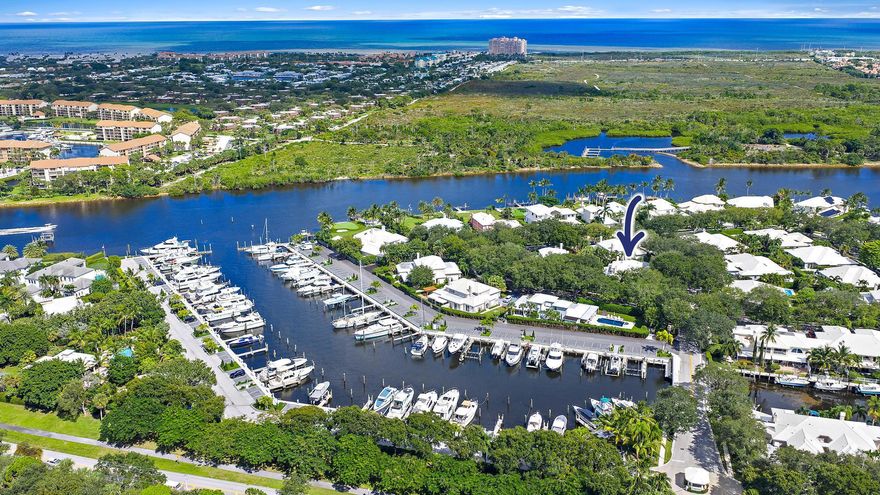 Cypress Island is one of Palm Beach Gardens' premier guard-gated communities, offering 24/7 security, tree-lined streets, a clubhouse, pool, and a  marina with slips up to 80 ft (available to purchase or rent, no fixed bridges).This CBS semi-detached courtyard townhome features a first-floor primary suite, soaring ceilings, wood-burning fireplace, impact glass, an updated kitchen with quartz countertops and stainless appliances, and renovated baths all within a bright, open floor plan.Enjoy your private backyard oasis with artificial turf and low-maintenance landscaping. The HOA covers landscaping, exterior painting, roof cleaning, security, cable, and amenities.Conveniently located in a quiet neighborhood near Juno Beach, restaurants and shops, just 20 minutes to PBI.