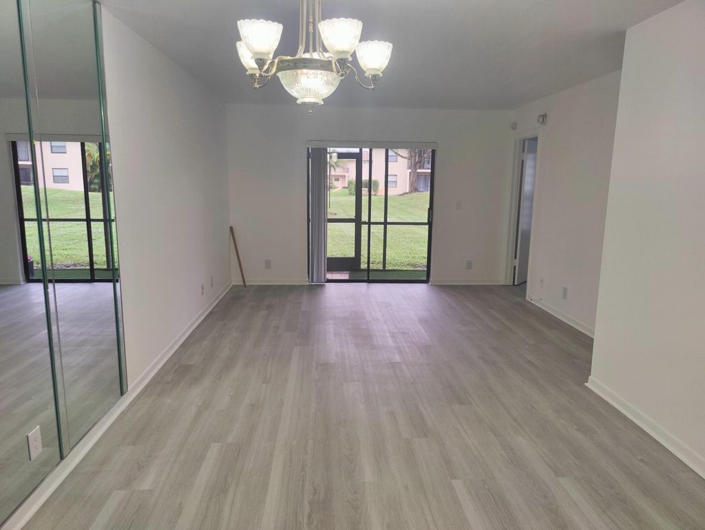 Photo of 6832 Palmetto Circle #102, Boca Raton, FL 33433 (MLS # R10917616)