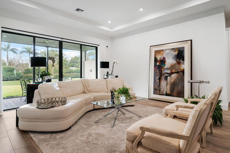 Sited on a prime lot with a large, elevated private west facing backyard looking onto a pond with a 180 degree unobstructed view, this newly built, pristine & chic, open concept 3 bedroom, 3 bath, 2 car garage residence is designed for casual luxe living. High-end finishes include a dramatic Great Room adjoining a stunning kitchen with GE Profile appliances & perfect entertaining island, formal dining room, two ensuite bedrooms with a spa-like master bath, 10' high ceilings, 8' doors,Private, gated Banyan Cay is located east of I-95, on campus with the New Belgrove Hotel autograph collection and, by invitation, to the ultra-exclusive Dutchman's Pipe club for golf, tennis and retreat. Convenient to Palm Beach, downtown , beaches, airport, fine dining & shopping