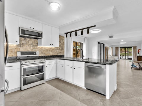 Photo of 8511 Boca Rio Drive, Boca Raton, FL 33433 (MLS # B26090840)