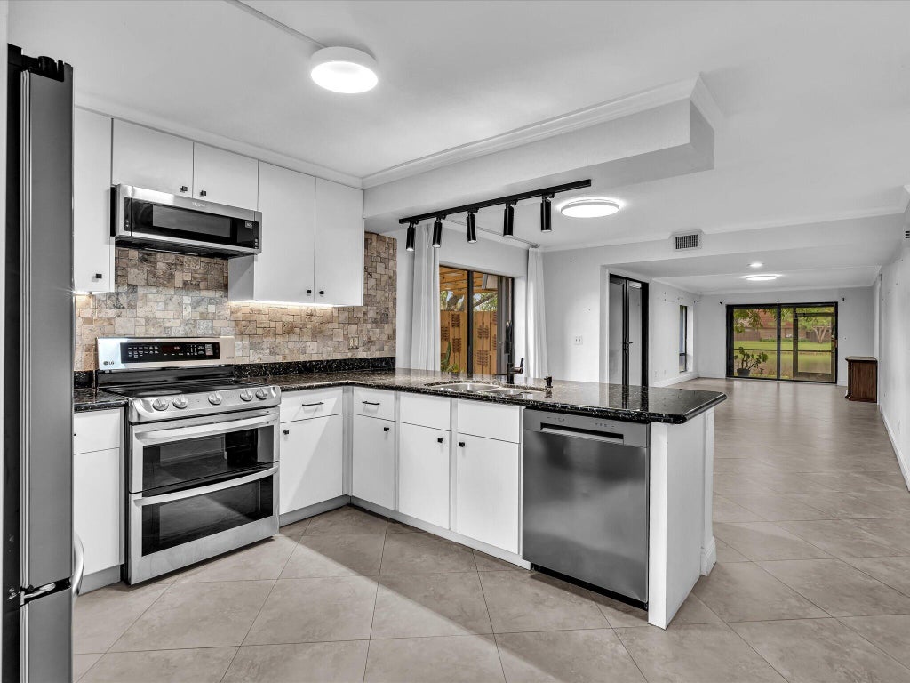 Photo of 8511 Boca Rio Drive, Boca Raton, FL 33433 (MLS # B26090840)