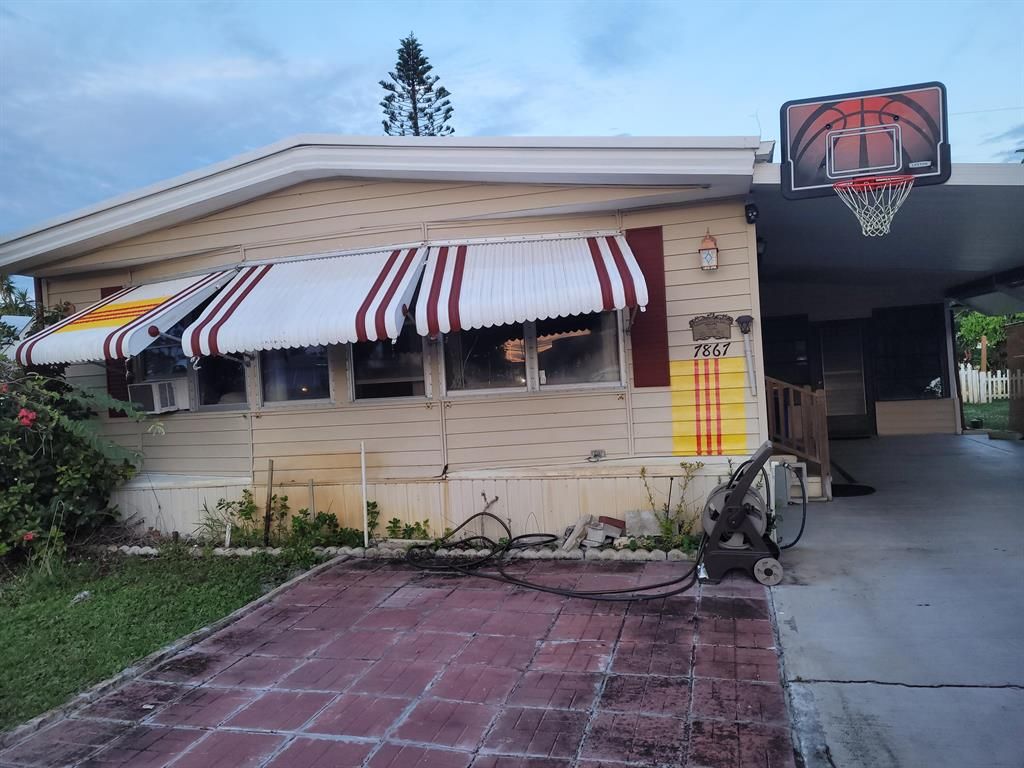 Photo of 7867 SE Swan Avenue, Hobe Sound, FL 33455 (MLS # R10848720)