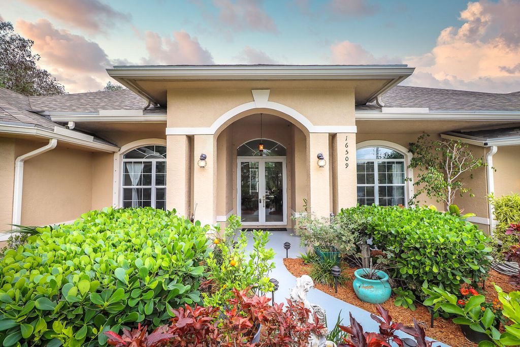 Photo of 16509 75th Avenue N, Palm Beach Gardens, FL 33418 (MLS # R10784516)