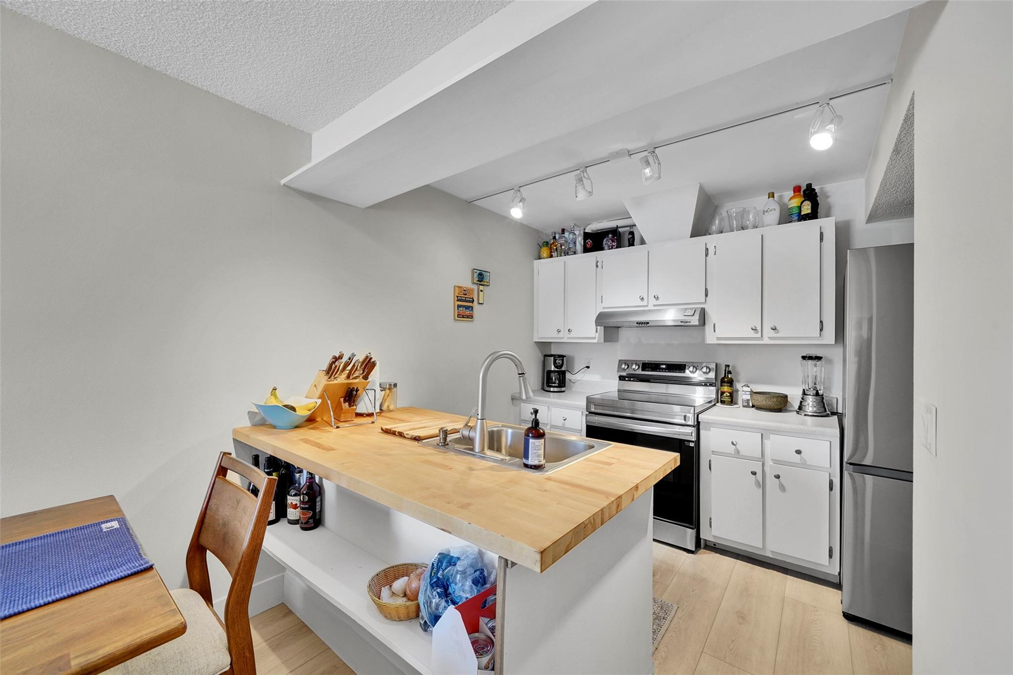 Welcome to Townhouse Isles, Wilton Manors' best-kept secrets. This hidden enclave of townhomes is located on a quiet Island just blocks from vibrant Wilton Dr. This 2-bedroom, 2.5-bath townhouse features an updated kitchen with new stainless steel appliances and a spacious living area that opens to a very private screened patio that is perfect for relaxing or entertaining. The second floor includes 2 spacious en-suite bedrooms with updated baths and great closet space. Both 1st and 2nd floors have new LVP floors and modern baseboards. The well-managed association has a budget that includes reserves and NO special assessments. This riverside community has a community pool and BBQ for your enjoyment. Surrounded by tranquil water, you will forget you are just minutes from everything.