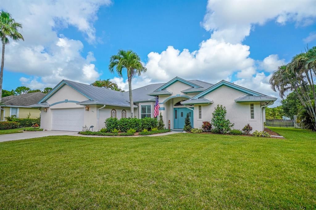 Photo of 543 SE Meadow Wood Way, Stuart, FL 34997 (MLS # R10885205)