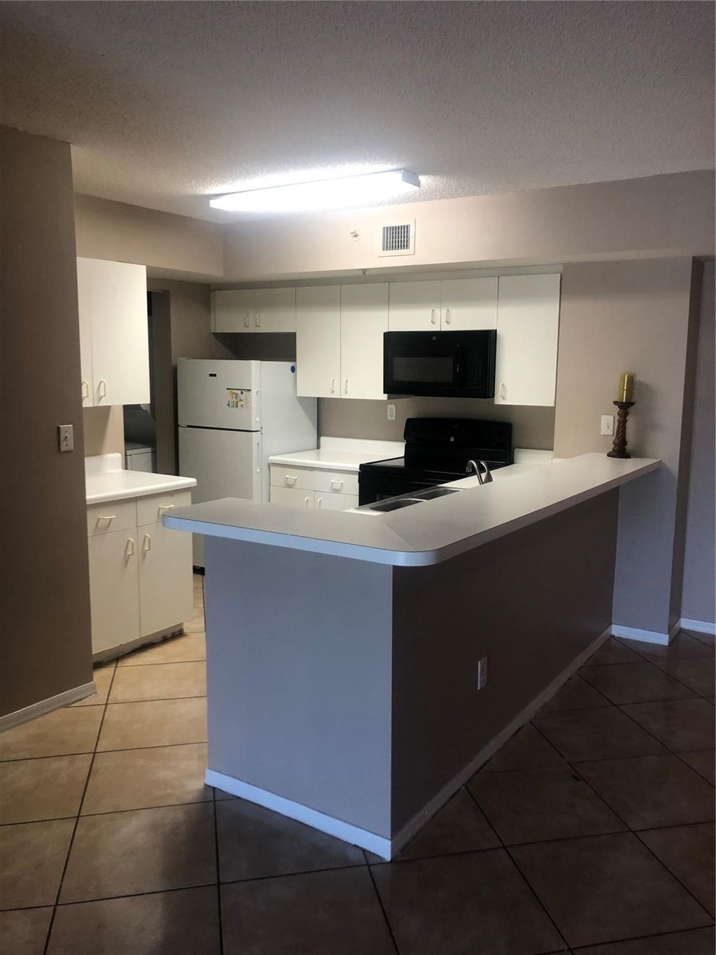 Photo of 2620 S University Drive #211, Davie, FL 33328 (MLS # F10503878)
