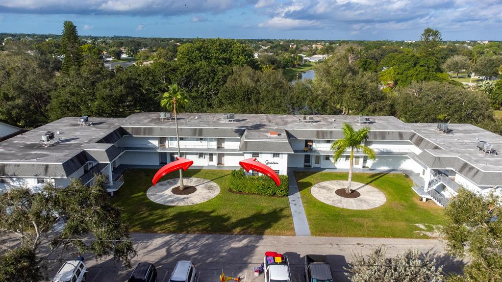 Remodeled 2 bedroom, 2 bath waterfront condo in Palm Garden Condos overlooking the Earman River! Updated kitchen with wood cabinets, granite, and stainless steel appliances (over is a double oven). 24'' tile in main areas and wood laminate floors in both bedrooms. Both baths updated. Accordion shutters on all windows. Fresh interior paint throughout. Split floor plan. Washer and Dryer inside the unit in hall closet (as well as in the building). Screened-in patio with tile overlooking the canal. The AC was replaced in 2018, water heater in 2019, and a new main water line was installed in 2022. Lots of wildlife and mature oak trees. Central location, close to shopping and highways. Amenities include clubhouse and pool.