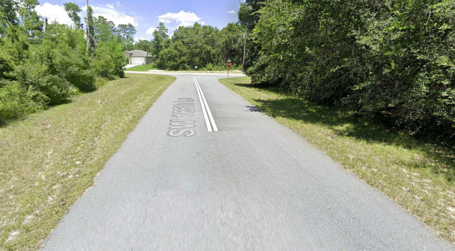 Come check out this beautiful lot located in the growing community of Marion Oaks. This parcel offers plenty of potential for those looking to build their new home. There are many new builds currently in the process of construction in this area. Convenient to I75, World Equestrian Center, shopping, schools, hospitals, mall, and restaurants! Looking to purchase property in Florida, look no further. Buying Land in Florida is a solid investment for your future. for directional purposes 2296 SW 165th LN