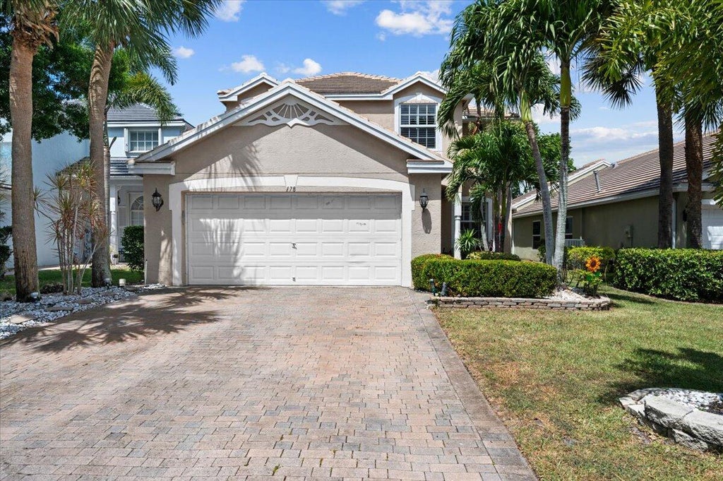 Photo of 178 Canterbury Place, Royal Palm Beach, FL 33414 (MLS # R10982358)