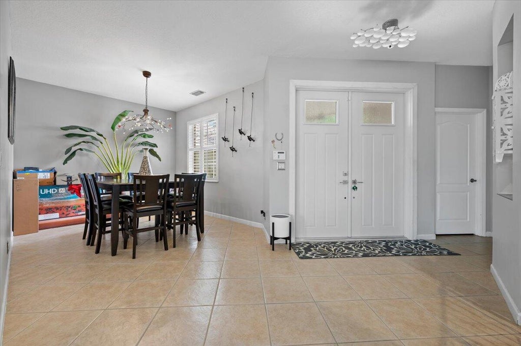 Photo of 178 Canterbury Place, Royal Palm Beach, FL 33414 (MLS # R10982358)