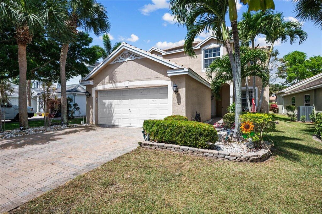 Photo of 178 Canterbury Place, Royal Palm Beach, FL 33414 (MLS # R10982358)