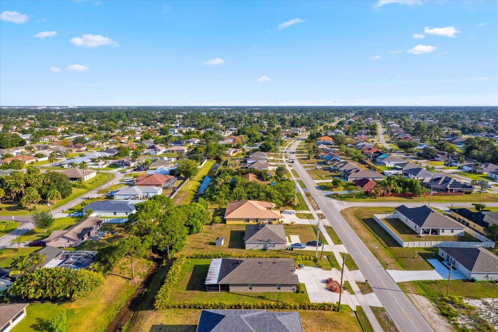 Photo of 3718 SW Savona Boulevard, Port Saint Lucie, FL 34953 (MLS # R10986345)
