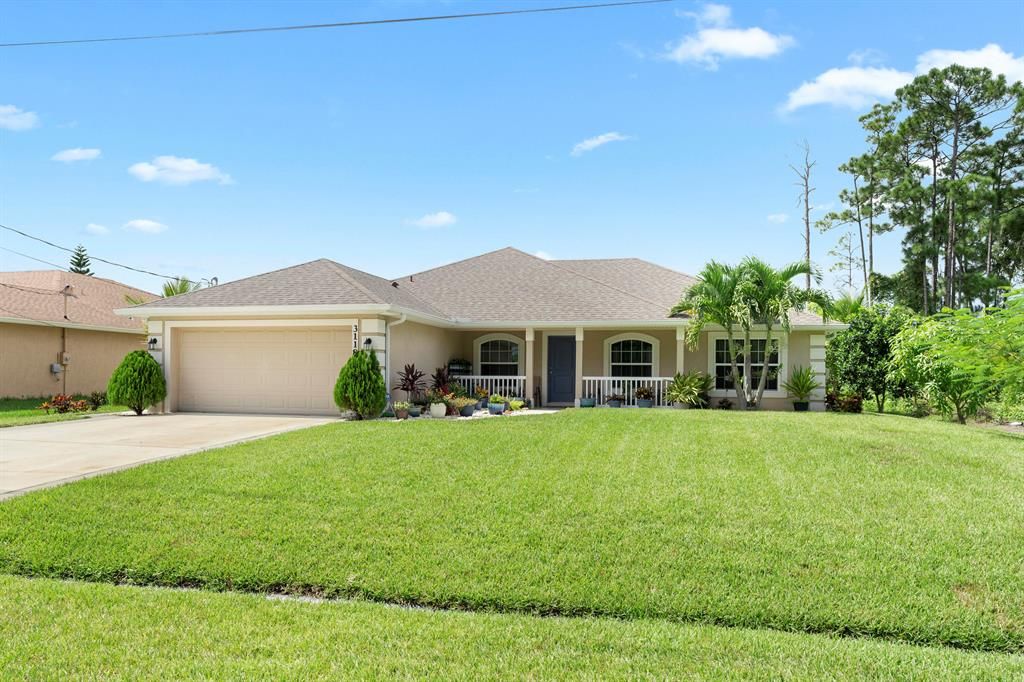 Photo of 3118 SW Martin Street, Port Saint Lucie, FL 34953 (MLS # R10747997)