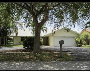 Spacious 3 bedroom 2 full bath home with circular driveway and a pool! New water heater, A/C 2020, and new pool pump motor 2023. Vaulted wooden ceilings, two spacious living rooms, and skylights. HOA is only $36 per quarter. This home is located in sought after Welleby neighborhood with many parks, splash pads, and the Sunrise Civic Center. Welleby Elementary School in the neighborhood just a 5 minute walk! *Sold AS IS*