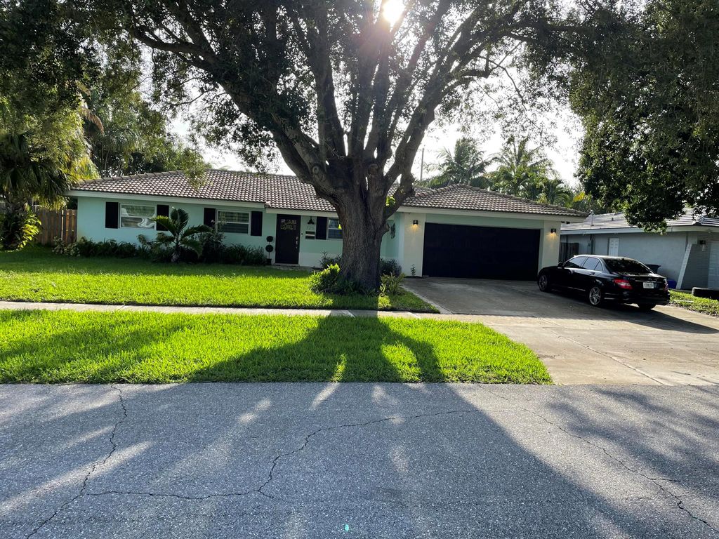 Photo of 725 Tradewind Drive, North Palm Beach, FL 33408 (MLS # R10903561)