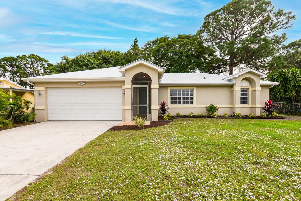 Photo of 110 SW Christmas Terrace, Port Saint Lucie, FL 34984 (MLS # R10938728)