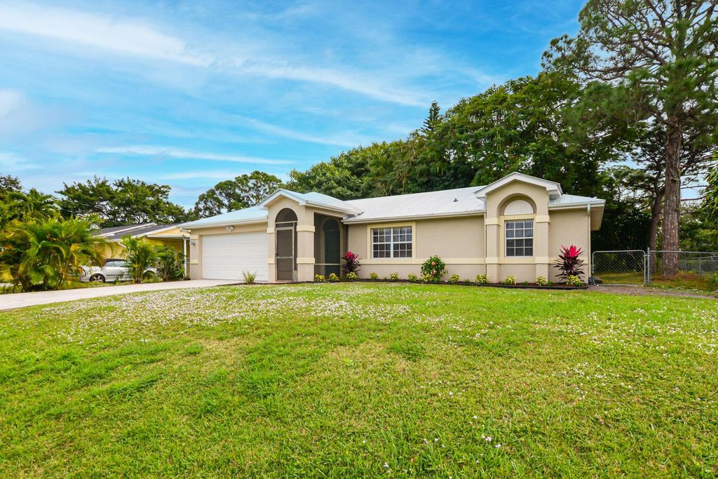Photo of 110 SW Christmas Terrace, Port Saint Lucie, FL 34984 (MLS # R10938728)