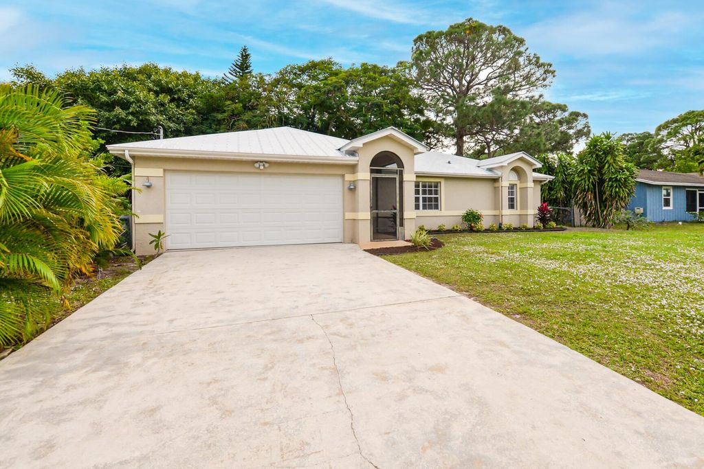 Photo of 110 SW Christmas Terrace, Port Saint Lucie, FL 34984 (MLS # R10938728)