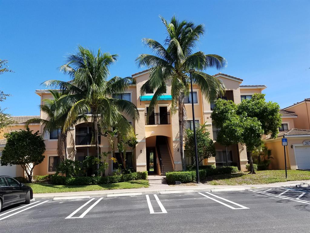 Spacious 2 bedroom 2 bath FIRST floor condo in gated resort community of San Matera. Laminate floors in living areas. Great walk in closets in both bedrooms. Nice pantry in Kitchen. New refrigerator. Carpet in split bedrooms. Washer and dryer in condo. Located off Prosperity Farms Rd or Kew Gardens Rd in beautiful Palm Beach Gardens. Close to restaurants, shopping, PBIA and only 1 hour to Miami. Community under reconstruction currently, although this building has most repairs completed.