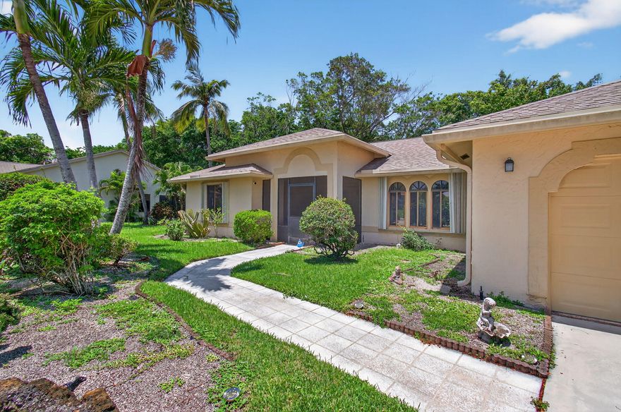RAINBERRY BAY - ACTIVE ADULT COMMUNITY FOR 55+.  Desirable Location—RIVIERA DRIVE.  RARE ADA-ACCESSIBLE HOME OPPORTUNITY.  Poised serenely in the idyllic neighborhood of Rainberry Bay in Delray Beach, Florida, sits 2925 Riviera Drive - a sterling testament to architecturally impressive craftsmanship, inviting aesthetics, and a thoughtful layout.  Bathed in bright Florida sunshine, this expansive single-family home sits gracefully on an oversized cul-de-sac lot within the coveted 'Estates' section. The astute buyer will find over 2,556 square feet of light-filled living area, brimming with breathtaking architectural details and a relaxed luxury that effortlessly conspires to make this entity feel like 'home'.   Be ushered into its unique charm as you step through the majestic double doors. A welcoming foyer sets the tone with two conveniently placed skylights that bathe the space in generous natural light. The elegant blend of tiled floors serves as a sophisticated canvas for displaying one's personal style through furniture and accessories.  The heartbeat of this home lies in its dynamic kitchen. Brought to life with custom cabinetry, this culinary wonder hosts an envious extra-large island, a backdrop for memorable meals and social gatherings. Adding to the allure of this focal area are elegant granite countertops, complemented by a practical deep sink and high-standard appliances - making every cooking venture an enjoyable endeavor.  The thoughtful design of the home extends to social settings. A formal dining room opens the doors to hosting splendid gatherings and unforgettable meals, enhancing the family-centric functionality of this abode. Bask in peaceful moments in the enclosed Florida room, where one could lose oneself in the pages of a novel or in restful reverie. For those who revel in the outdoors, the screened patio serves as a comfy shelter for larger gatherings, extending the entertaining capacity, while the home's accordion shutters provide added assurance.  At 2925 Riviera Drive, the exceptional size of the property, combined with its unique location near the resident's back gate, truly distinguishes it from the ordinary. This distinctive dwelling offers an outstanding opportunity to experience a remarkable blend of spaciousness, relaxation, and convenience - a rare gem in Delray Beach's superb landscape.  Among the home's superior amenities is its commitment to accessibility.   RARE ADA-ACCESSIBLE HOME OPPORTUNITY.  This home is fully architecturally compliant with ADA Accessibility Standards, providing a true barrier-free living environment for maximum accessibility and comfort.   To further emphasize its functionality, the home also features an on-demand, full-house generator system.  Beautifully maintained, this house embodies Florida living at its best. Discover your ideal home away from home with the accessibility, luxury, and location that 2925 Riviera Drive in Delray Beach offers.  Rainberry Bay offers a wide range of amenities designed for both relaxation and recreation. Residents can enjoy 10 Har-Tru tennis courts, including 2 lighted courts for evening play. There are also 2 lighted bocce courts and 8 lighted pickleball courts for nighttime fun. For swimming enthusiasts, there are 5 year-round swimming pools, with one pool illuminated for nighttime swims.  The clubhouse features various facilities, including arts-and-crafts rooms, billiards and card rooms, and conference rooms. The library is well-stocked with books, puzzles, and DVDs. For those looking to stay active, there is an exercise room, and residents can catch a movie or show in the theater. Additionally, the community is secured by a 24-hour manned welcome gate, providing added peace of mind.  ROOF--2019 (covered by the HOA) A/C----8/22, HWH—2017.   $2,059 QUARTERLY HOA COVERS BASIC CABLE, INTERNET (COMCAST), LANDSCAPING, PAINTING OF THE HOUSE EVERY 7 YEARS, ROOF REPLACEMENT (EVERY 20-25 YRS), POWERWASHING OF THE DRIVEWAYS AND WALKWAYS ONCE A YEAR, GUTTER CLEANING THREE TIMES A YEAR, SECURITY SERVICES, INCLUDING OVERNIGHT DRIVING AROUND THE NEIGHBORHOOD.  BUYER PAYS ONE-TIME CAPITAL CONTRIBUTION—$2,059.