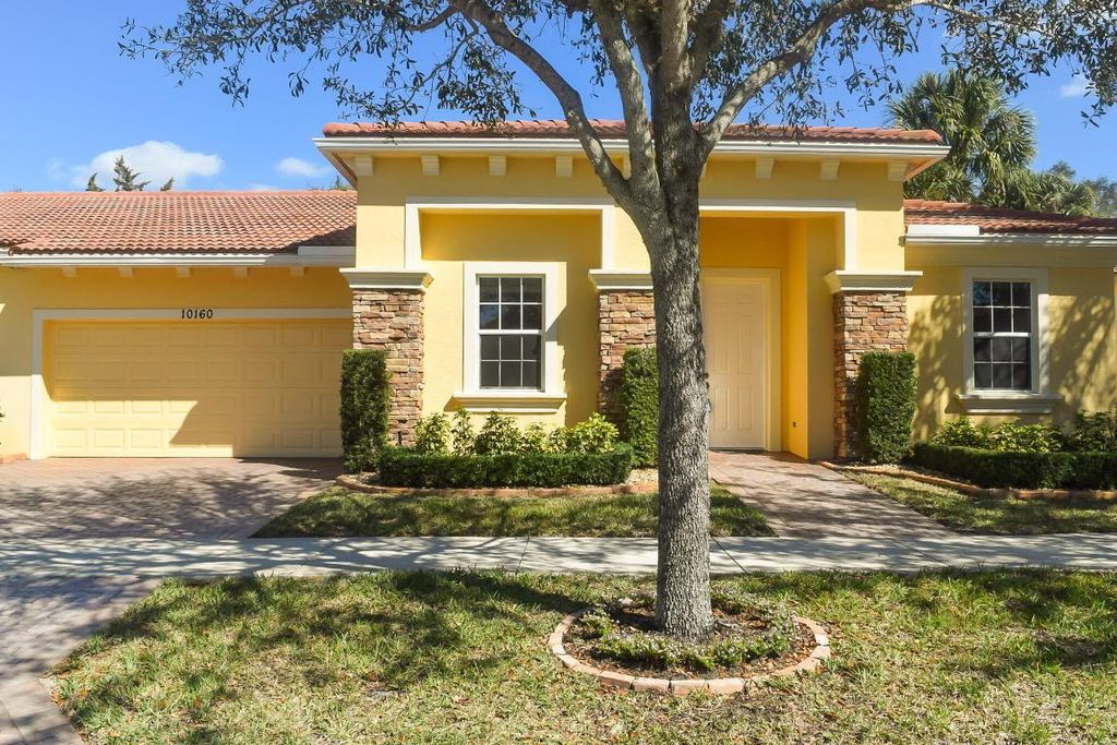 Photo of 10160 SW Canossa Way, Port Saint Lucie, FL 34986 (MLS # R10955823)