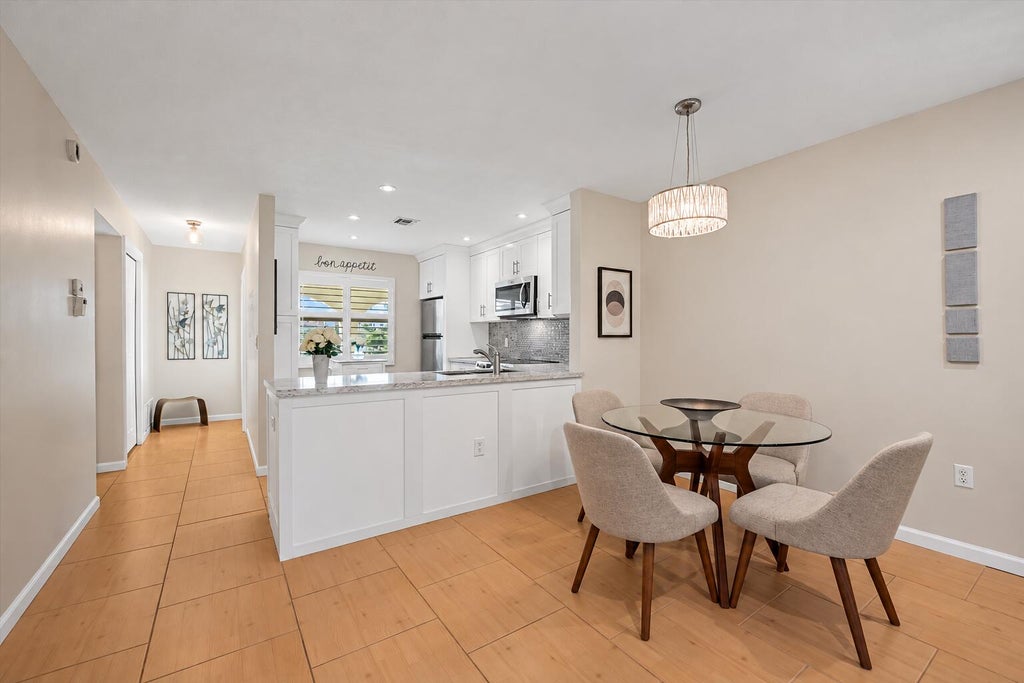 Photo of 717 S US Hwy 1 #114, Jupiter, FL 33477 (MLS # B26088361)