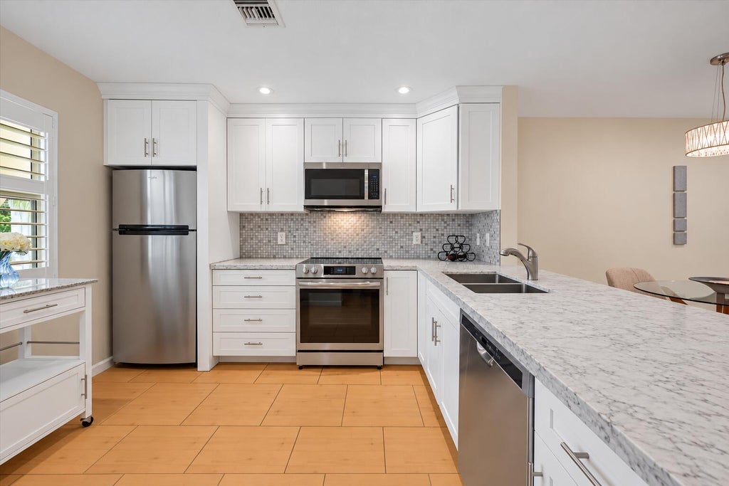 Photo of 717 S US Hwy 1 #114, Jupiter, FL 33477 (MLS # B26088361)