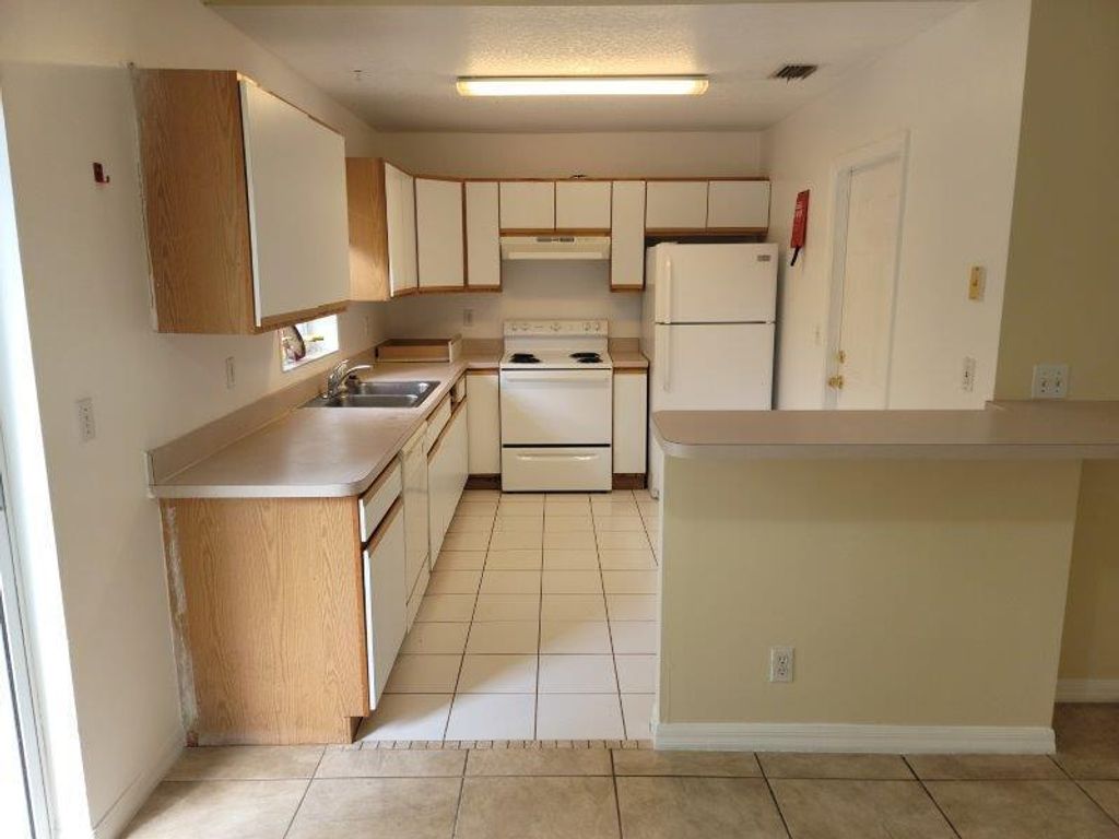 Photo of 4483 Timber Ridge Lane, Fort Pierce, FL 34982 (MLS # R11059383)