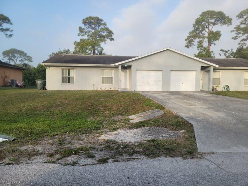 Photo of 4483 Timber Ridge Lane, Fort Pierce, FL 34982 (MLS # R11059383)