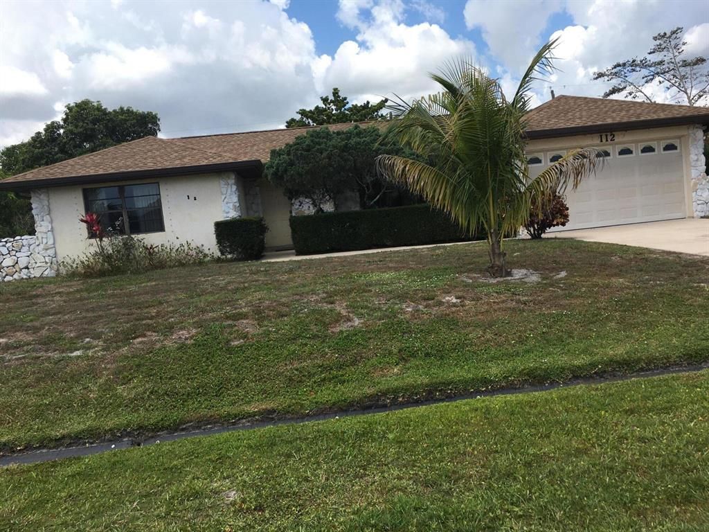 Photo of 112 NW Curtis Street, Port Saint Lucie, FL 34983 (MLS # R10715248)