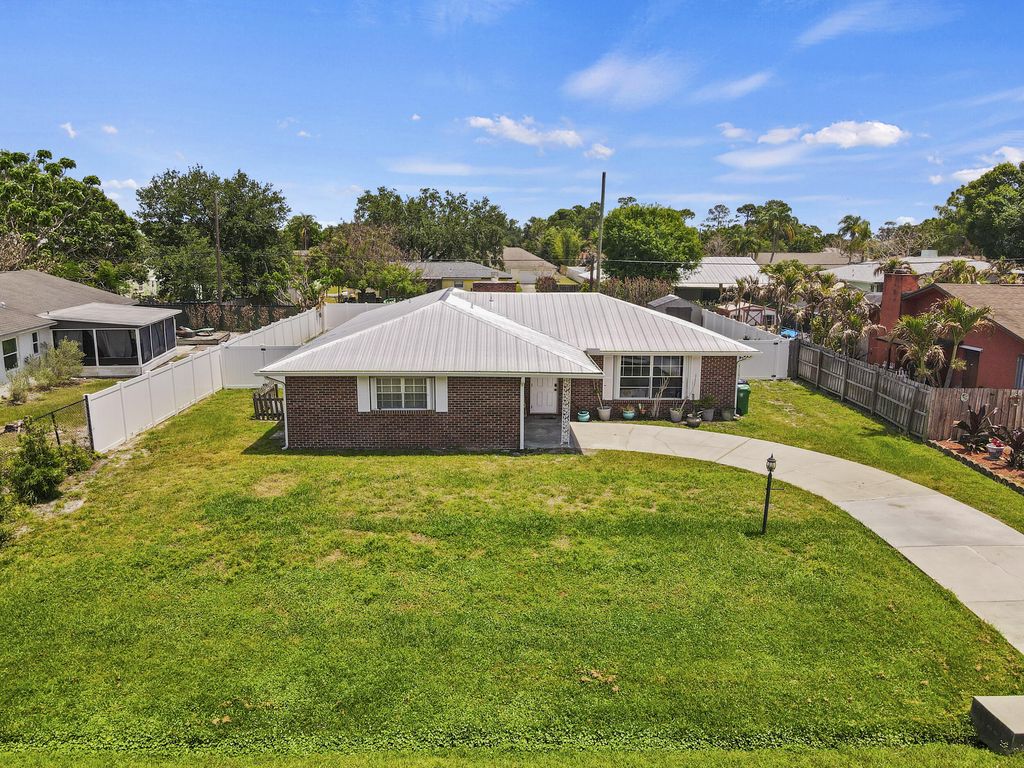 Photo of 1609 SE Clearmont Street, Port Saint Lucie, FL 34983 (MLS # B26025623)