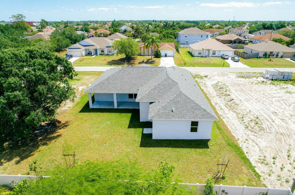 Photo of 3486 SW Princeton Street, Port Saint Lucie, FL 34953 (MLS # R10971422)