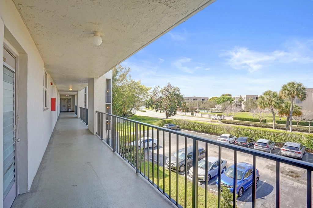 Photo of 9480 Poinciana Place #304, Davie, FL 33324 (MLS # F10555447)