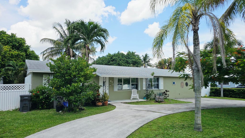 Photo of 911 Burch Drive, West Palm Beach, FL 33415 (MLS # B26054852)