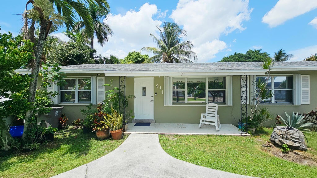 Photo of 911 Burch Drive, West Palm Beach, FL 33415 (MLS # B26054852)