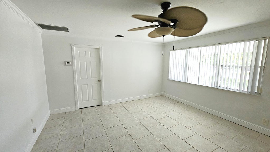 Photo of 911 Burch Drive, West Palm Beach, FL 33415 (MLS # B26054852)