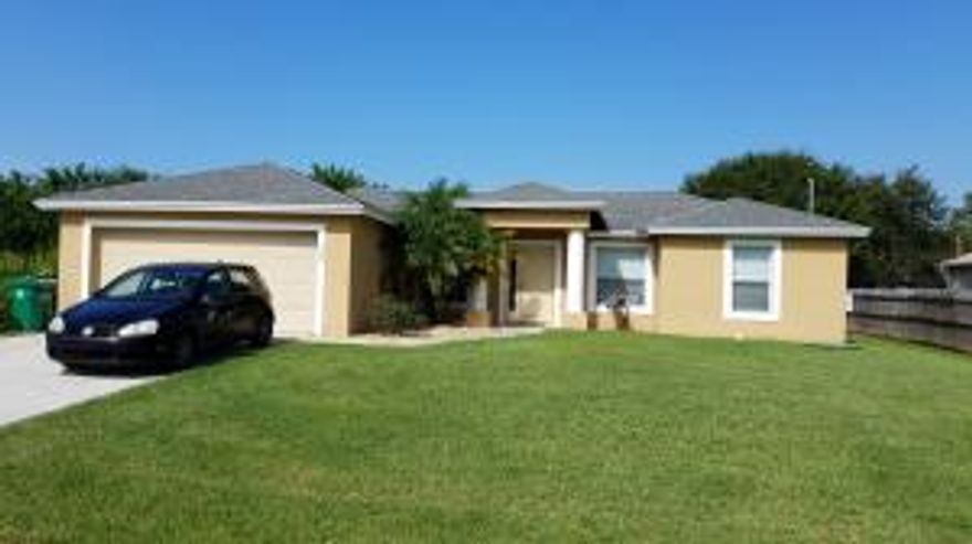 Home features tile floors throughout the living, kitchen and baths, carpet in the bedrooms, split floor plan, duel vanity in the master bath, walk-in master closet, 2 car garage, and private(mostly fenced) back yard.