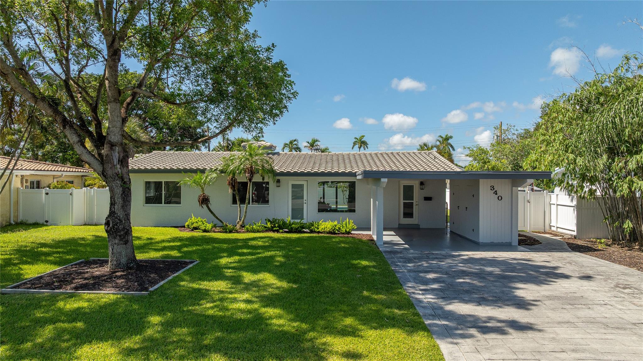 Come discover this charming 3-bdrm, 2-bthrm, No HOA, single-family pool home in the sought after coastal area neighborhood of Norwood in Pompano Beach. Well maintained by owner for many years. Quintessential Mid-Mod original bathrooms & kitchen. Views of pool deck from den, living, dining, kitchen & primary bdrm areas boasts natural light. Features: IMPACT Windows/Doors(2022), New W/D(2025). Pool pump(2024), Diamond Brite(2004), electric panel interior/exterior(2022), AC(2015), Roof(2004), PVC privacy fence(2005). Dishwasher does not operate. Large private back yard with Southern exposure & shaded patio. Easy access to beach, golf, parks, shopping & much more. Home offers space & flexibility in a prime location—just minutes from beach with great potential for your ideal family lifestyle.