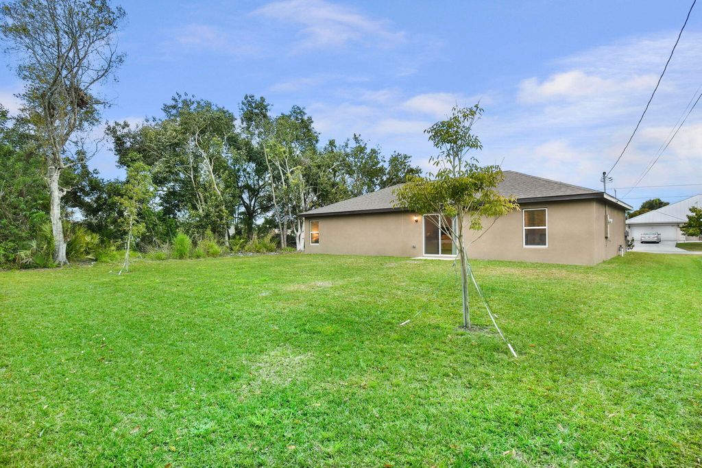 Photo of 2010 SW Beard Street, Port Saint Lucie, FL 34953 (MLS # R11053561)