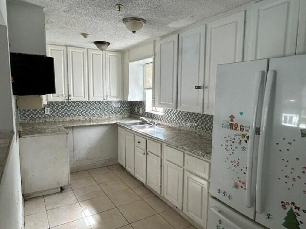 Photo of 2000 Longwood Road, West Palm Beach, FL 33409 (MLS # R11169047)