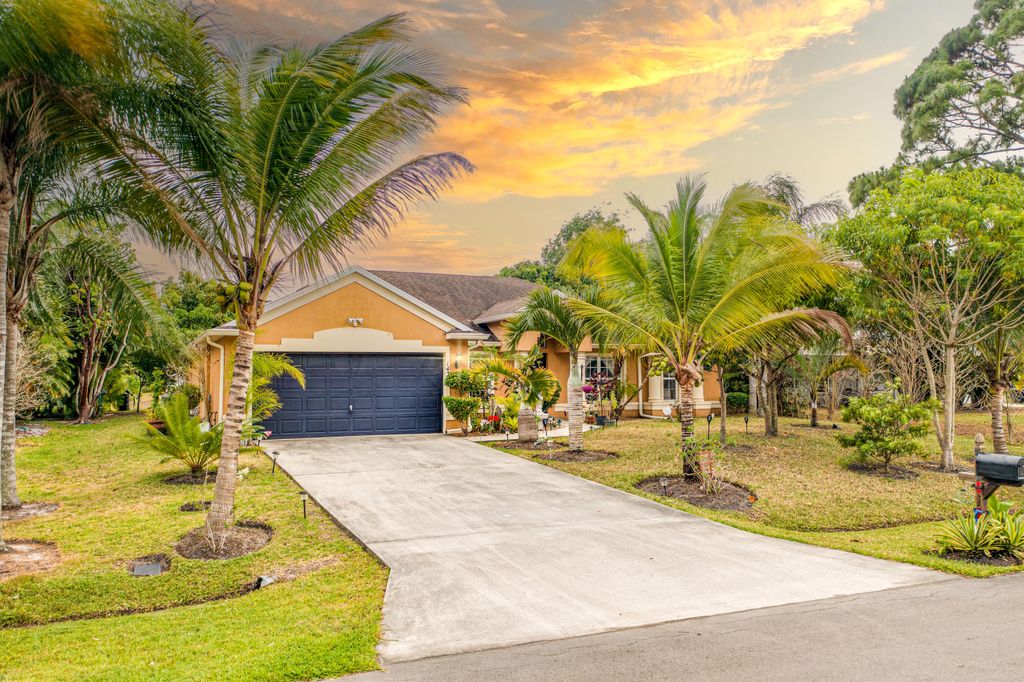 Photo of 1420 SW Patricia Avenue, Port Saint Lucie, FL 34953 (MLS # R10799151)