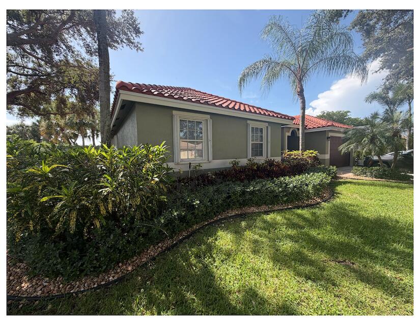 Photo of 6305 NW 43rd Terrace, Coconut Creek, FL 33073 (MLS # B26073073)