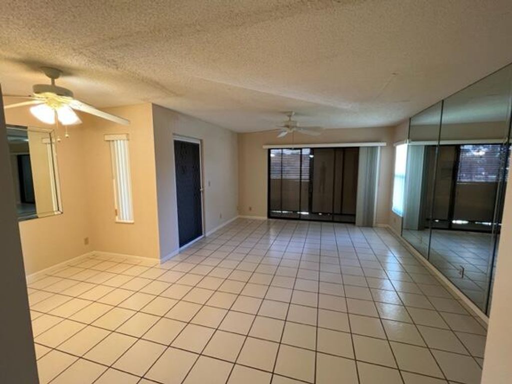 Photo of 825 Sky Pine Way #C2, Greenacres, FL 33415 (MLS # R10944693)