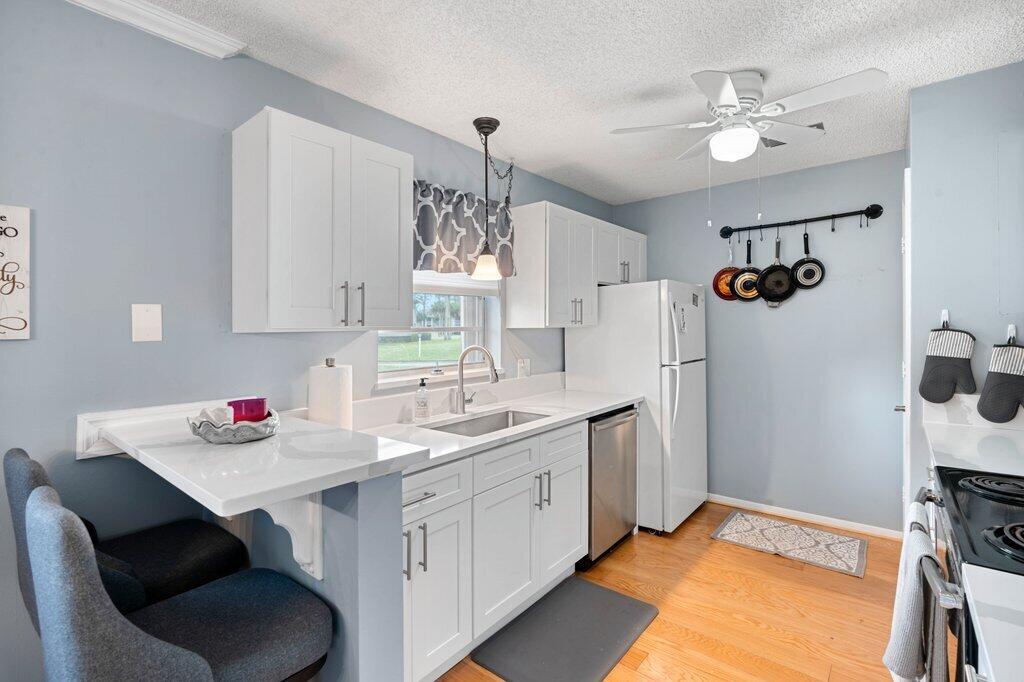 Photo of 27 Lake Vista Trail #107, Port Saint Lucie, FL 34952 (MLS # R11035827)