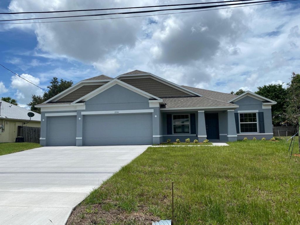 Photo of 2314 SW Woodridge Street St, Port Saint Lucie, FL 34953 (MLS # R10813820)