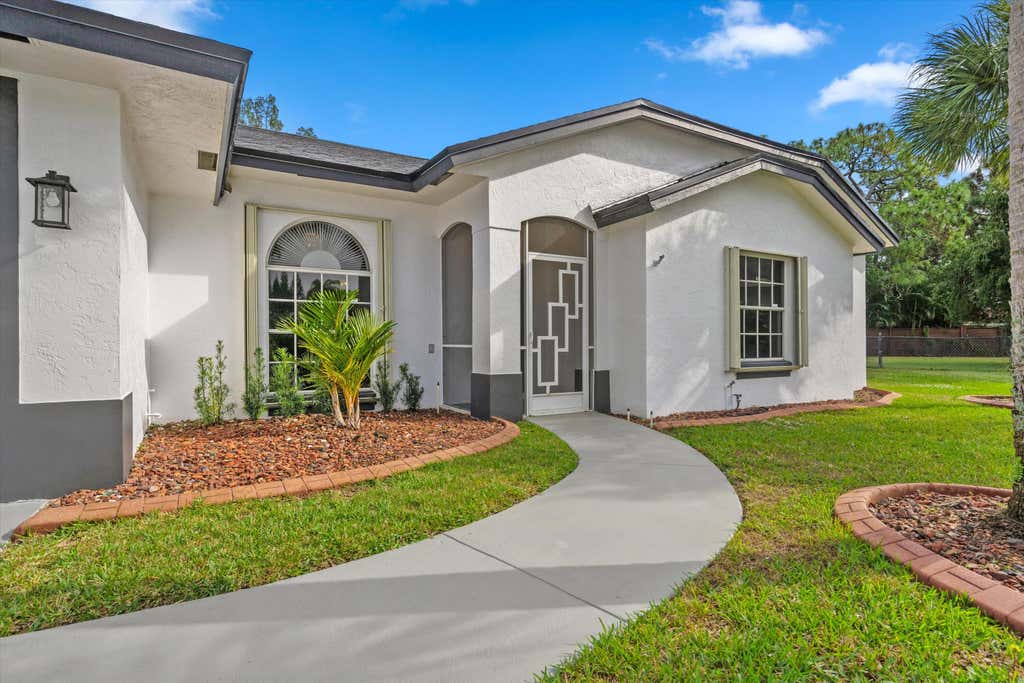 Photo of 104 Greenwood Place, Royal Palm Beach, FL 33411 (MLS # R11152597)