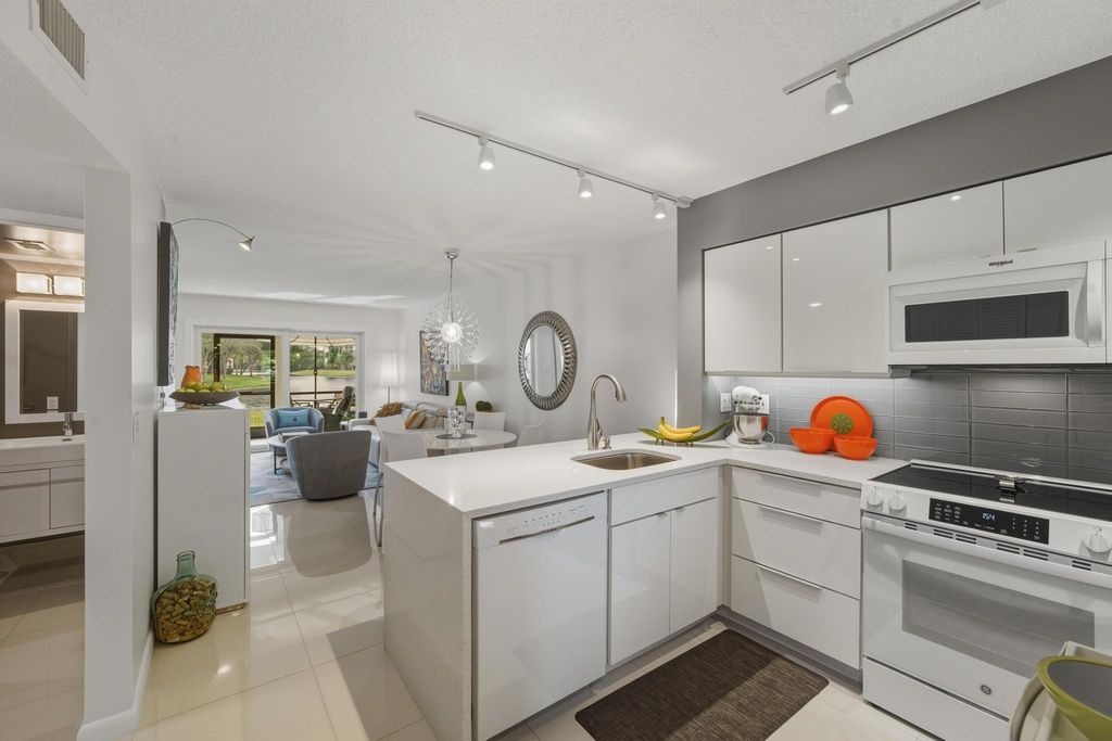 Photo of 2226 N Cypress Bend Drive #102, Pompano Beach, FL 33069 (MLS # F10550291)