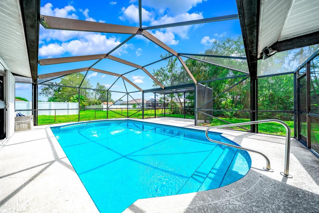 Photo of 155 NW Friar Street, Port St Lucie, FL 34983 (MLS # R10891272)