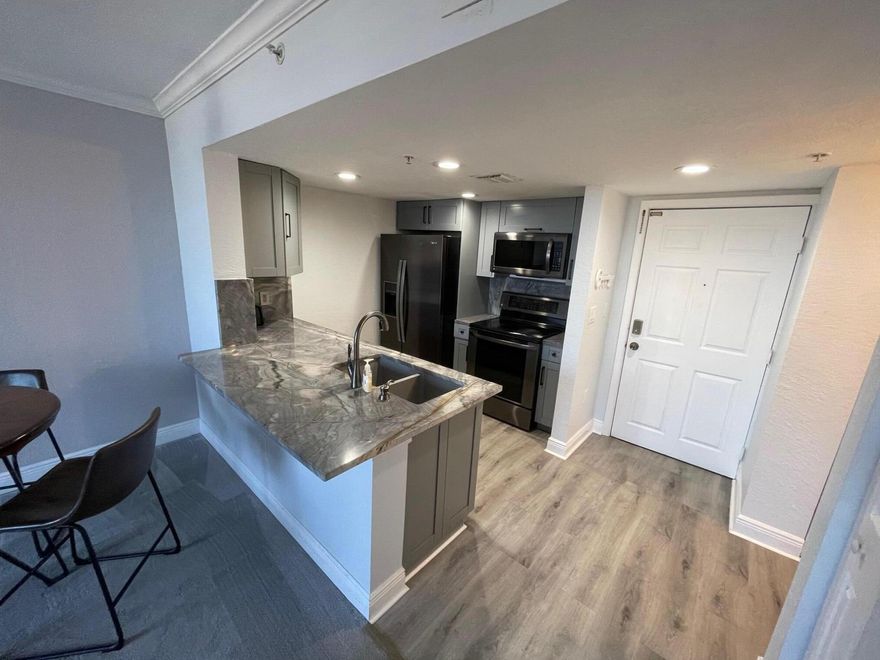 This bright, gorgeous Furnished condo is move-in ready Nicely updated including a BRAND NEW A/C SYSTEM, updated kitchen with stainless steel appliances, Granite countertops and wood cabinets. New front loading washer & dryer. Great sunset views. Flagler Pointe is a pet-friendly building that offers 24-hour security and covered parking. Covered balcony to enjoy the weather and the views. Flagler Pointe's resort-style swimming pool and spa, sauna, outside grilling space with bar, plus community room, fitness studio, game room, billiard room, business center. SEASONAL RATES ARE $3500 PER MO for 3 Months, $3250 PER MO. for 4 months, $3000 PER MO. for 6 months