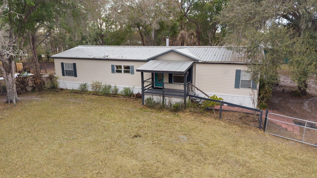 Photo of 23801 SW Martin Highway, Okeechobee, FL 34974 (MLS # B26008484)
